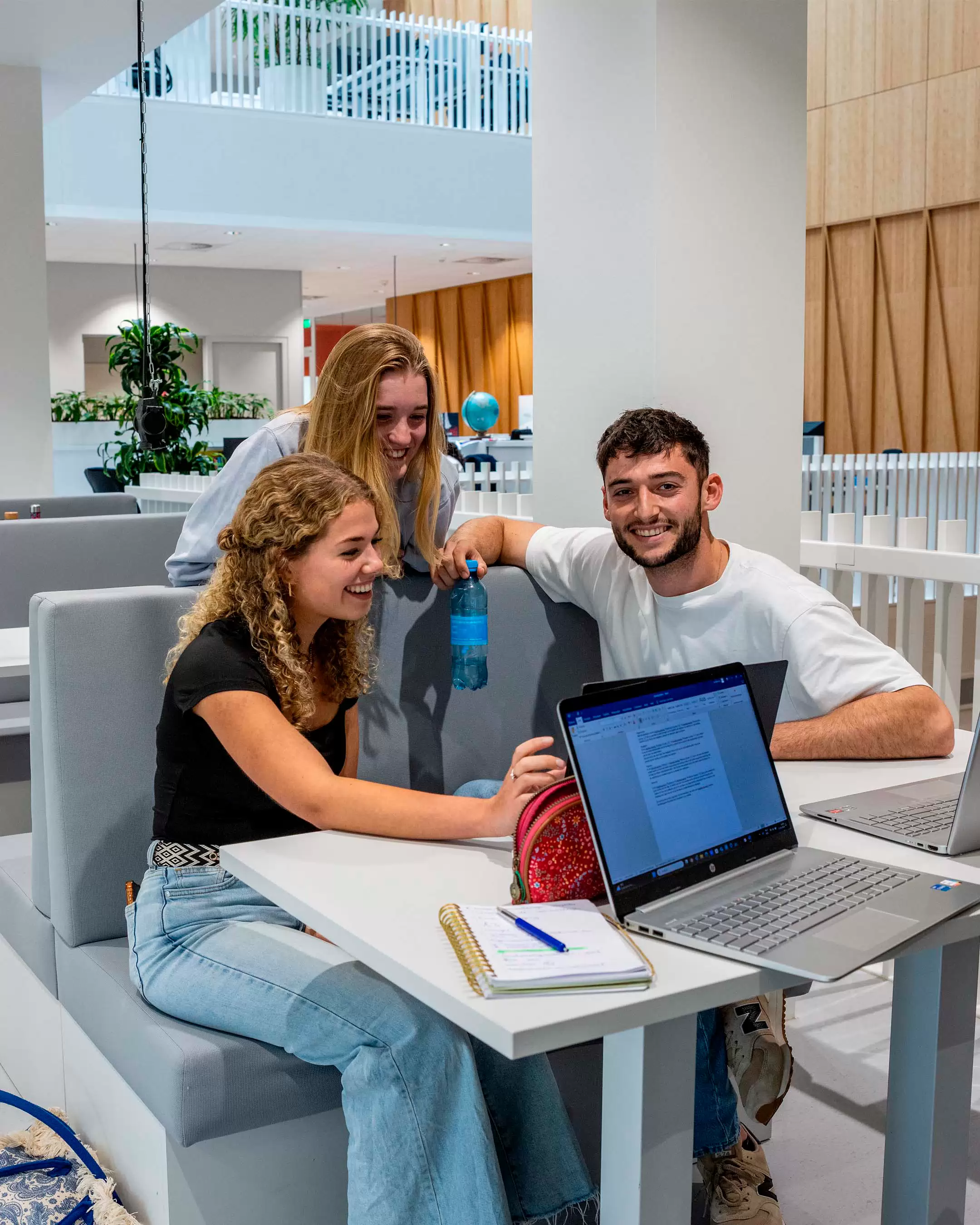 Three students talking