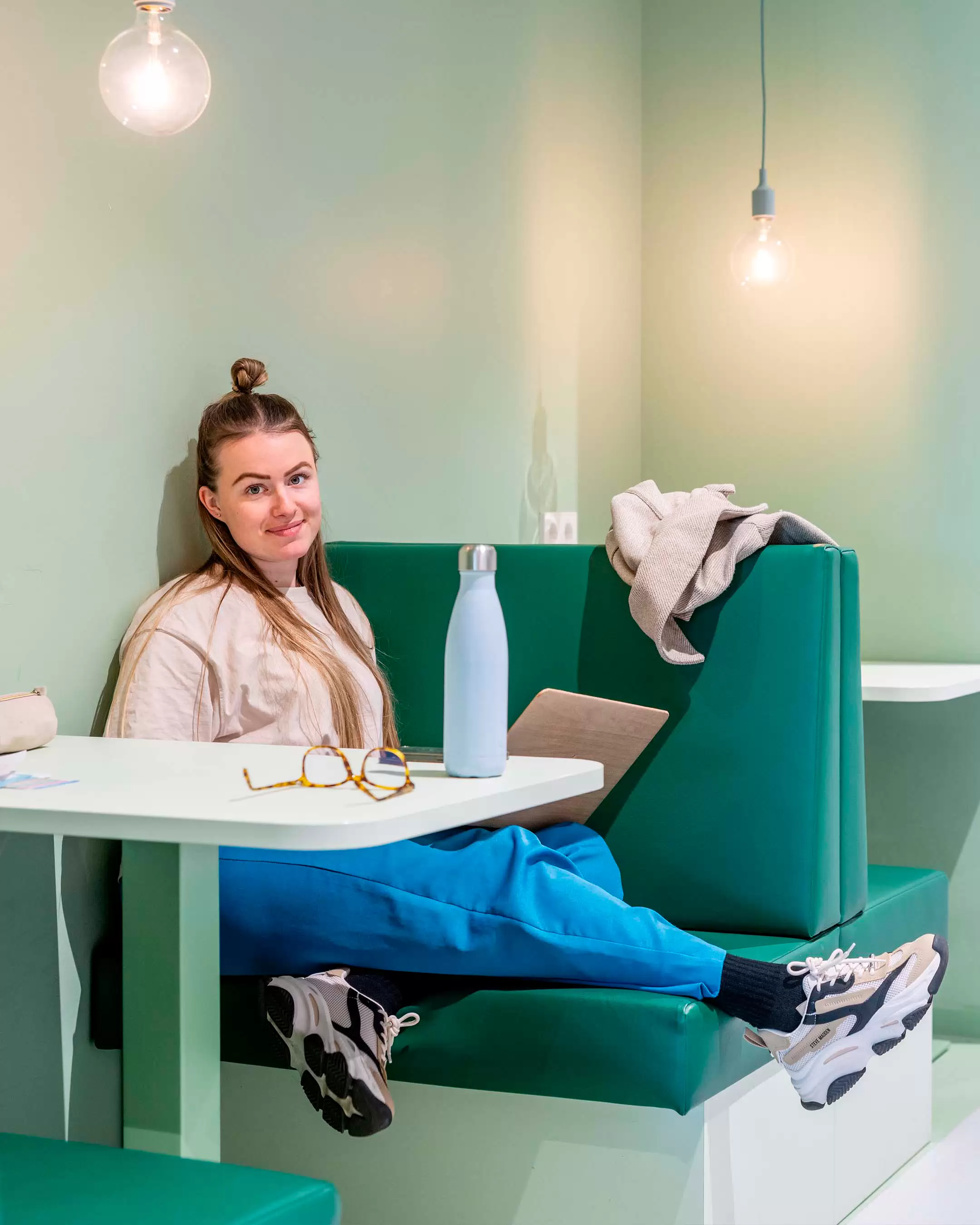 Students looking at a laptop