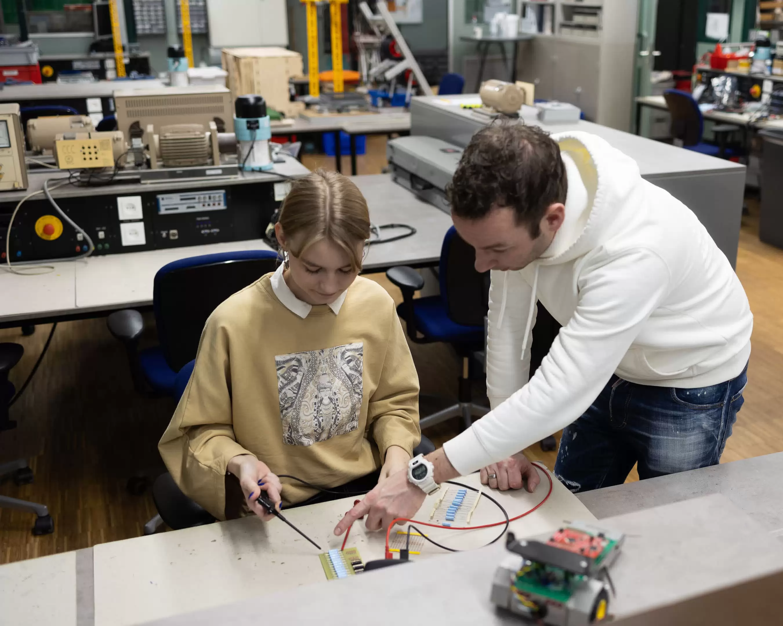 Two students from Mechatronics working on an asignment