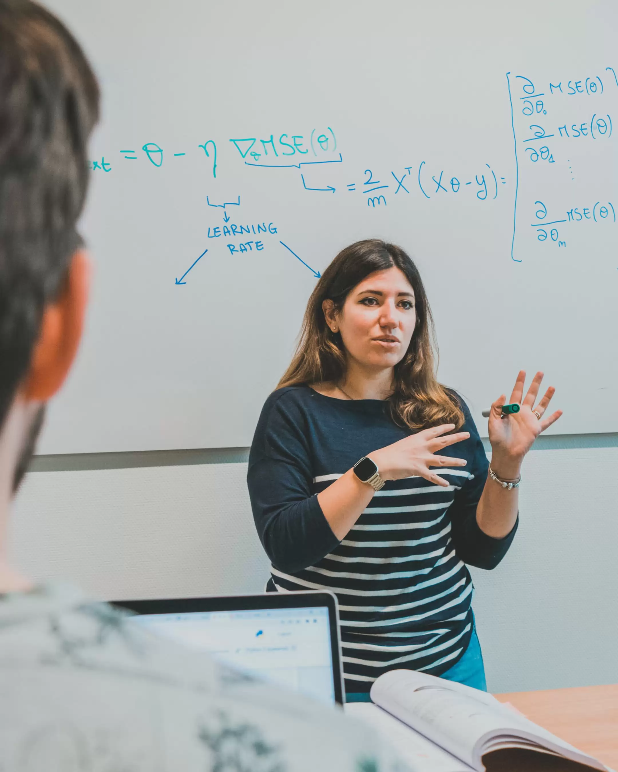 Teacher Master Digital Technology Engineering in front of whiteboard