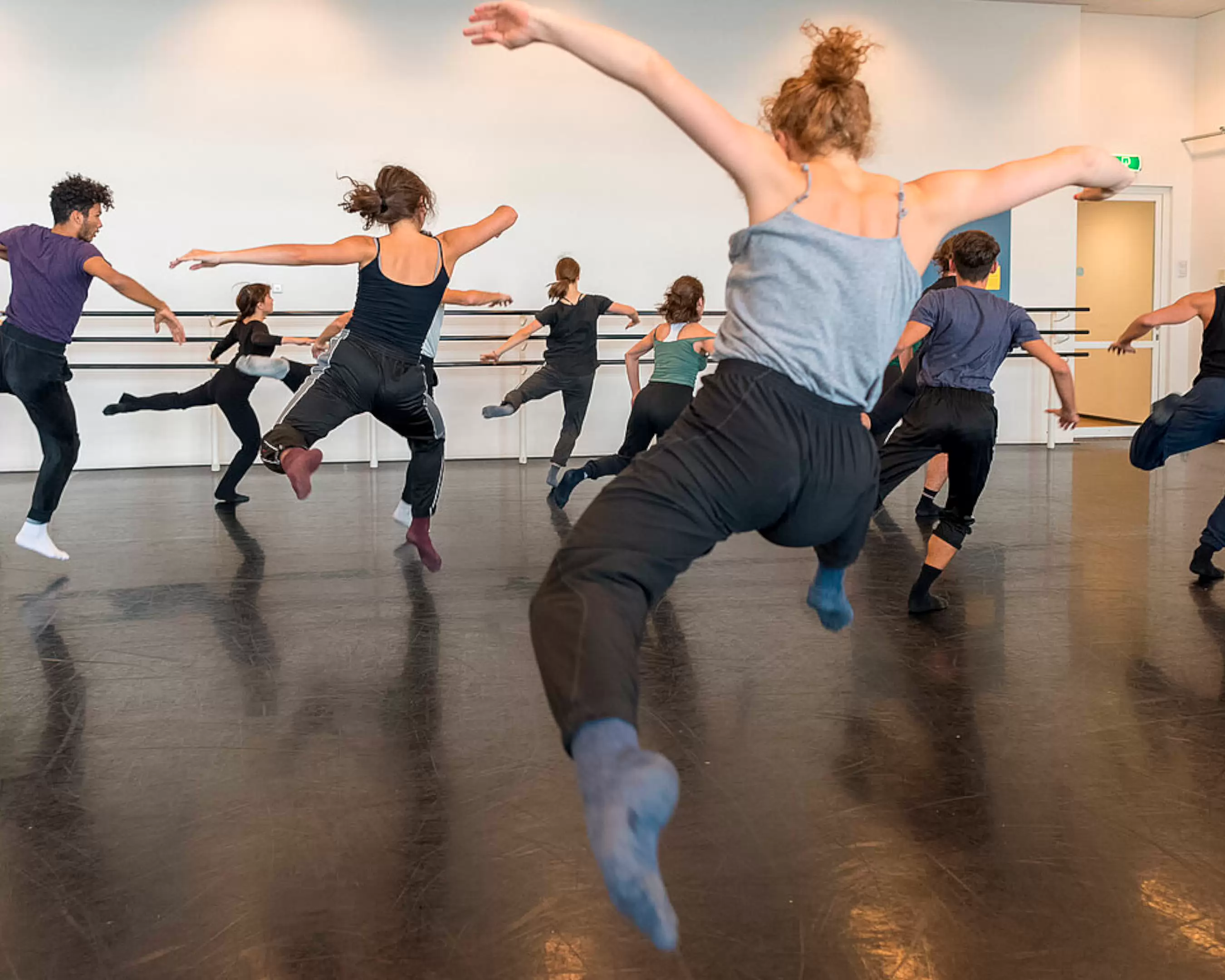 Students are rehearsing in the dance studio of Fontys Academy of the Arts
